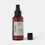 Olio corpo Lisu di Insula - Natural Body Care con elicriso e olio di riso in flacone ambrato con erogatore spray
