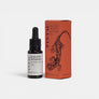 Olio per tatuaggi PINTAU di Insula - Natural Body Care in flacone di vetro da 15ml con scatola color terracotta.